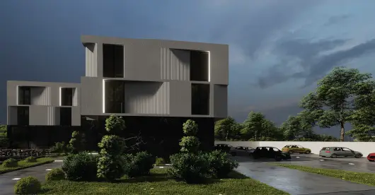 A modern, multi-story residential building with a minimalist design, featuring large windows and geometric shapes, surrounded by greenery and a parking lot under a cloudy sky.